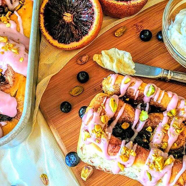 Blueberry Cinnamon Rolls w/ Blood Orange Yogurt Glaze