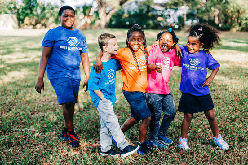 Image of children with arms around each other